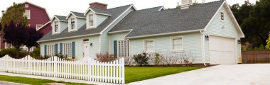 Blue Exterior - White Picket Fence - Green Grass